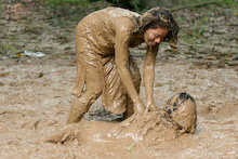 Deep Mud Fight What's better than two pretty sisters brawling in the m...